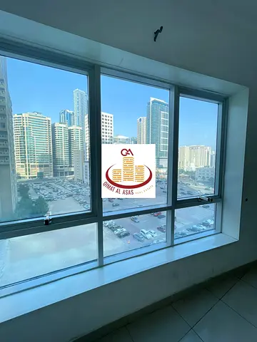 For annual rent: two bedrooms, a master living room with parking - Al Khan area