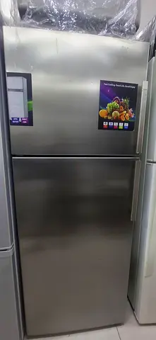 Used stainless steel double-door refrigerator - good condition