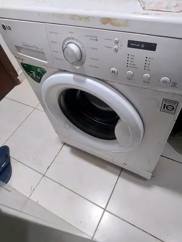 LG Front Load Washing Machine - Used, Good Working Condition but water flow is slow.