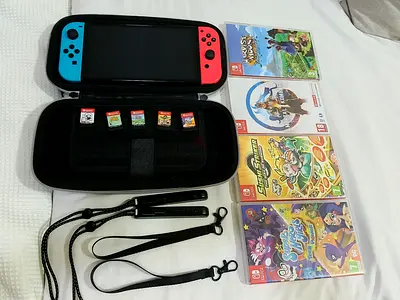 Nintendo Switch console with 6 games, case and straps (neon Joy-Con)