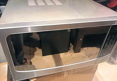 THROW AWAY PRICE! MICROWAVE AT 100