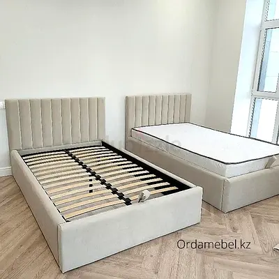 Pair of Beige Upholstered Single Beds