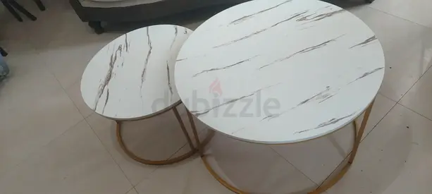 Set of 2 round nesting coffee tables with marble-effect tops