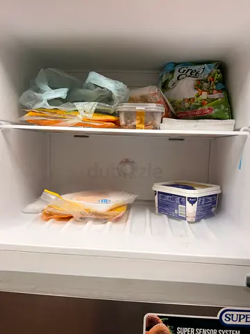 Used Refrigerator with Deep Freezer - Compact Interior, Excellent Working condition