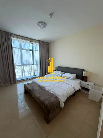 A fully furnished 2-bedroom apartment, with sea view balcony, including all services, with a gym, swimming pool, and private parking.