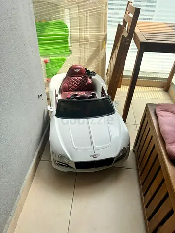 Kids electric ride-on Bentley-style car - white, single seat