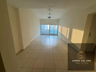Two master bedrooms, large living room, balcony with open view, three bathrooms, laundry room, gym,