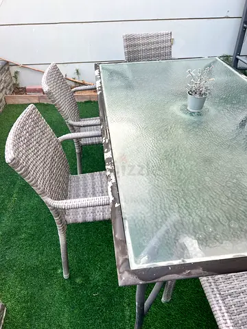 Outdoor dining table with 6 chairs - glass top