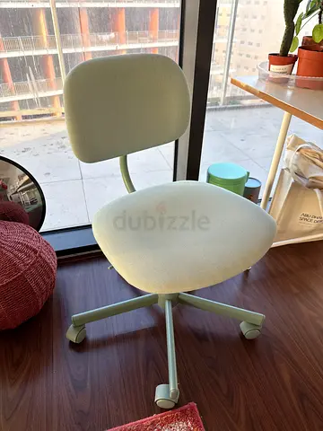 IKEA swivel desk chair in light green - good condition