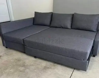 Grey L-shaped Sofa Bed with Storage - Good Condition