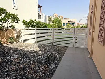 Modern white slatted garden fence and gate, white powder coated.