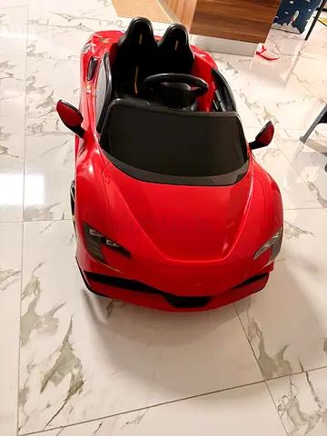 Red Electric Ride-On Sports Car for Kids - 2 Seater, with remote and can use pedal also