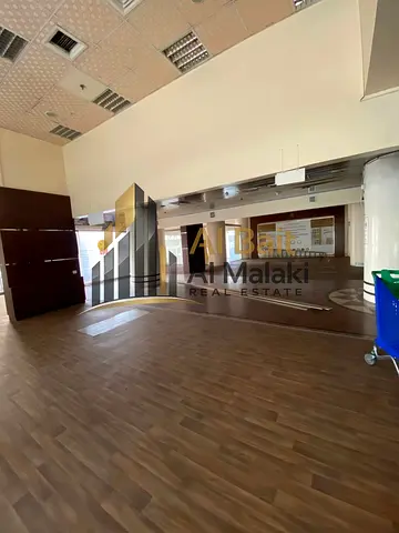 Commercial Showroom for Rent on Main Road – Al Majaz 1 * Prime 6000 Sq.ft Showroom in a Strategic L