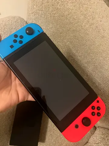 Nintendo Switch console with Neon Joy-Cons - Good working condition and that’s the best price for it