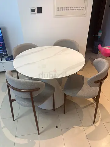 Round Marble-Top Dining Table with 4 Upholstered Grey Chairs