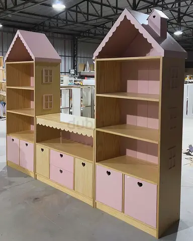 Large Wooden Dollhouse-Style Shelving Unit with Pink Accents