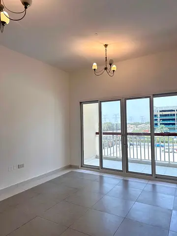 Unfurnished 1BR + Balcony | Sandhurst House | JVC | Monthly Payments Available
