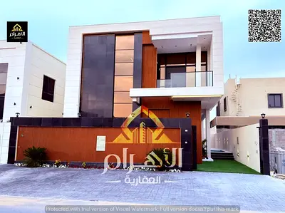 A luxurious two-story villa with a roof terrace for sale in the Al Bahia area, featuring a modern design and spacious interiors, including reception a