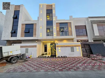 A luxurious 5-bedroom villa spread over two floors and a rooftop terrace, located in a prime locati