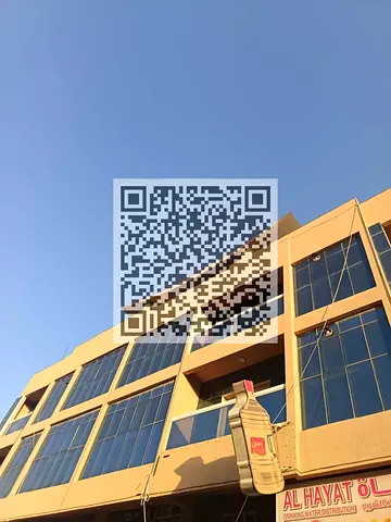 Residential and commercial building in Al-Muwayhat 1 for sale