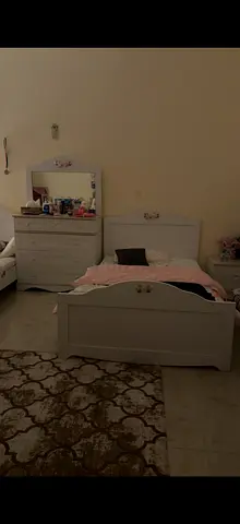 2 White single bed without mattress , 2 drawer table  1 dresser and mirror