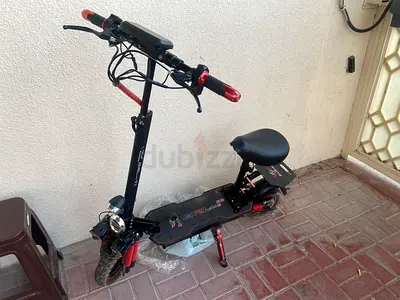 Electric Scooter with Seat — Good Condition, Ready to Ride