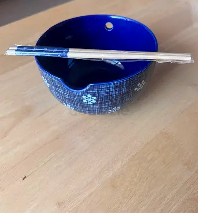 Blue ceramic ramen/noodle bowl with chopsticks