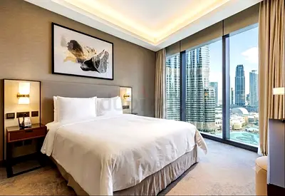 Premium Queen Bed with Integrated Designer Lamps + Luxury Simmons Mattress From Address Residences.
