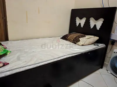 Single wooden bed with mattress - used, good condition