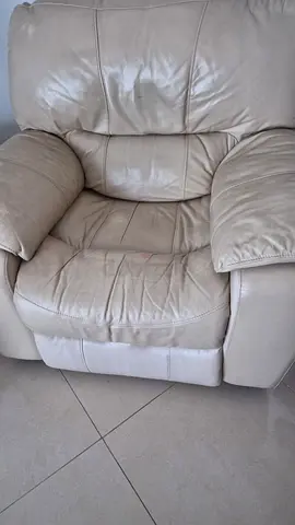 Beige leather recliner armchair - used, good condition