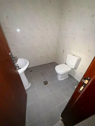 For Rent in Ajman – Al Nuaimiya 2 One-bedroom apartment with living room Officially approved for bachelors Good space and well-maintained finishing Pr