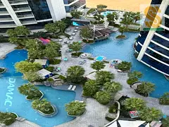 Pool and Burj Khalifa view I Luxury Living