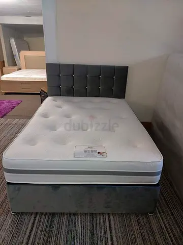 Queen size upholstered divan bed with headboard