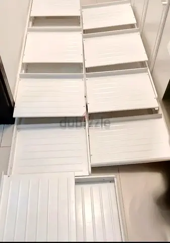 White Metal Pull Out Shoe Rack IKEA pull-out shoe racks without a drawer. The price of the rack fro
