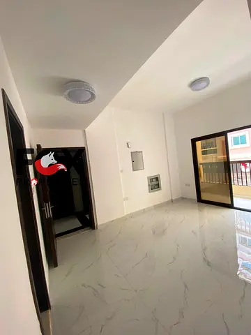Two-bedroom apartment with a living room for annual rent in Ajman, Al Rumaila 1. New building (first-time occupancy). 2 bathrooms. Balcony. Price: 40k