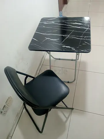 Folding table with chair