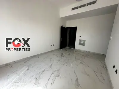 Largest living room and hall available for annual rent in Al Muweihat 3, Ajman. New building, first occupant, with balcony, central air conditioning,