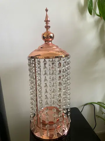 Decorative crystal-beaded table lamp with copper finish. Purchased trom home centre