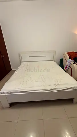 White wooden King Size bed frame with headboard, mattress  fitted sheet - good condition (186x210)