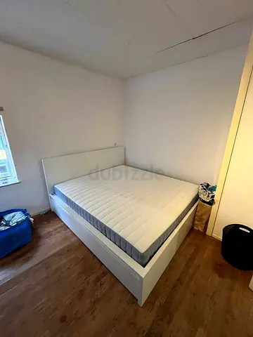 Ikea King White Malm bed frame with Ikea King mattress