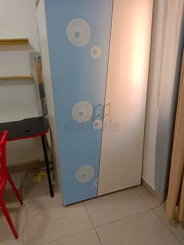 Two-door wardrobe in white and blue