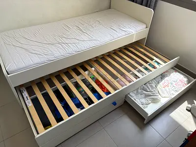 Ikea bed with pull out mattress and drawers