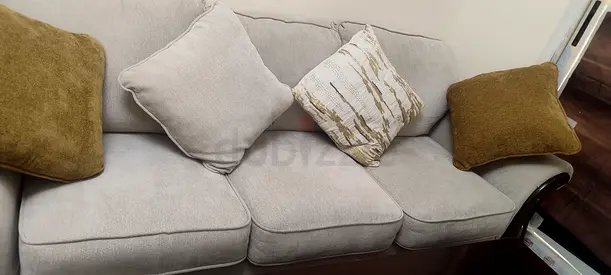 Need to go by tomorrow its Urgent  fabric sofa with wooden frame - light beige, good condition.