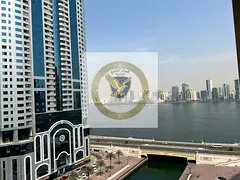 Apartment for annual rent in Al Majaz, 3 free parking spaces, spacious, open sea view with balcony,
