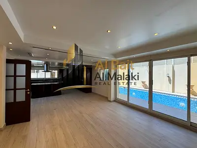 Luxury Villa with a Spacious Layout, Private Swimming Pool, Driver's Room, Guard's Room, and Covered Parking
