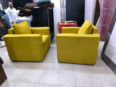 Pair of yellow fabric armchairs - good condition