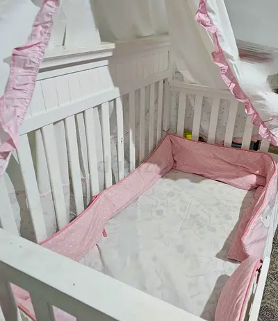 White Wooden 3 in 1 convertable Baby Crib with  mattress and Pink Canopy  (optional)- Good Condition
