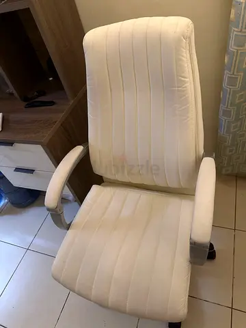 White ergonomic swivel office chair with armrests - good condition