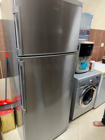 Silver top-freezer refrigerator - good working condition