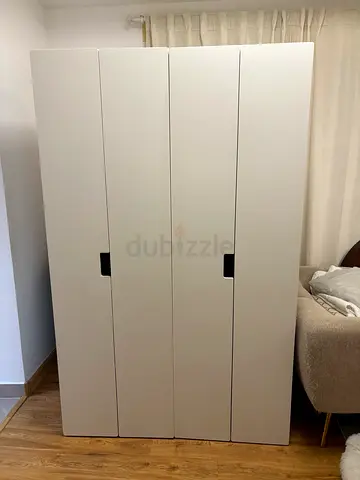 Two White 2-Door Wardrobe in Good Condition. Total dimensions w120xh190cm.